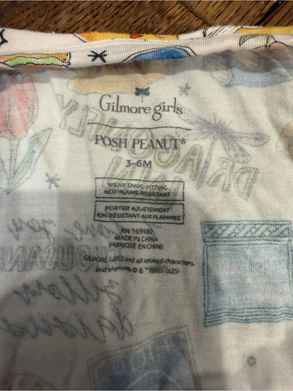 Posh Peanut x Gilmore Girls One-Piece with Pink Cuffs and Multicolor Print